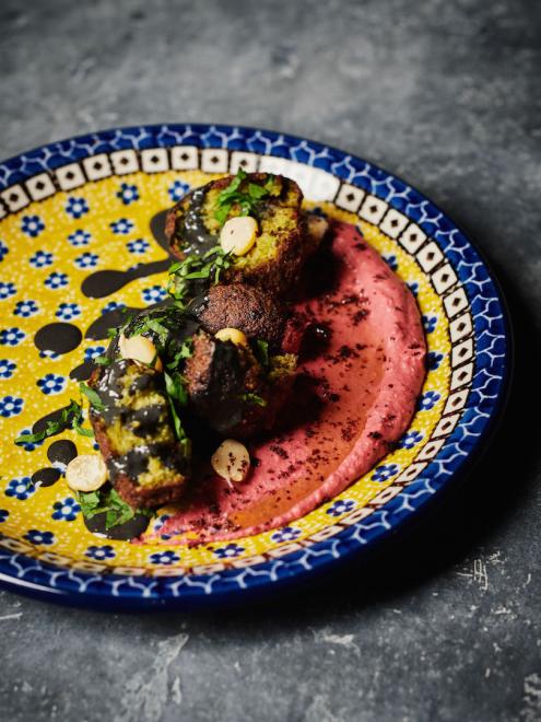 Salam-Edamame falafel, beet hummus, bluck tahini sauce